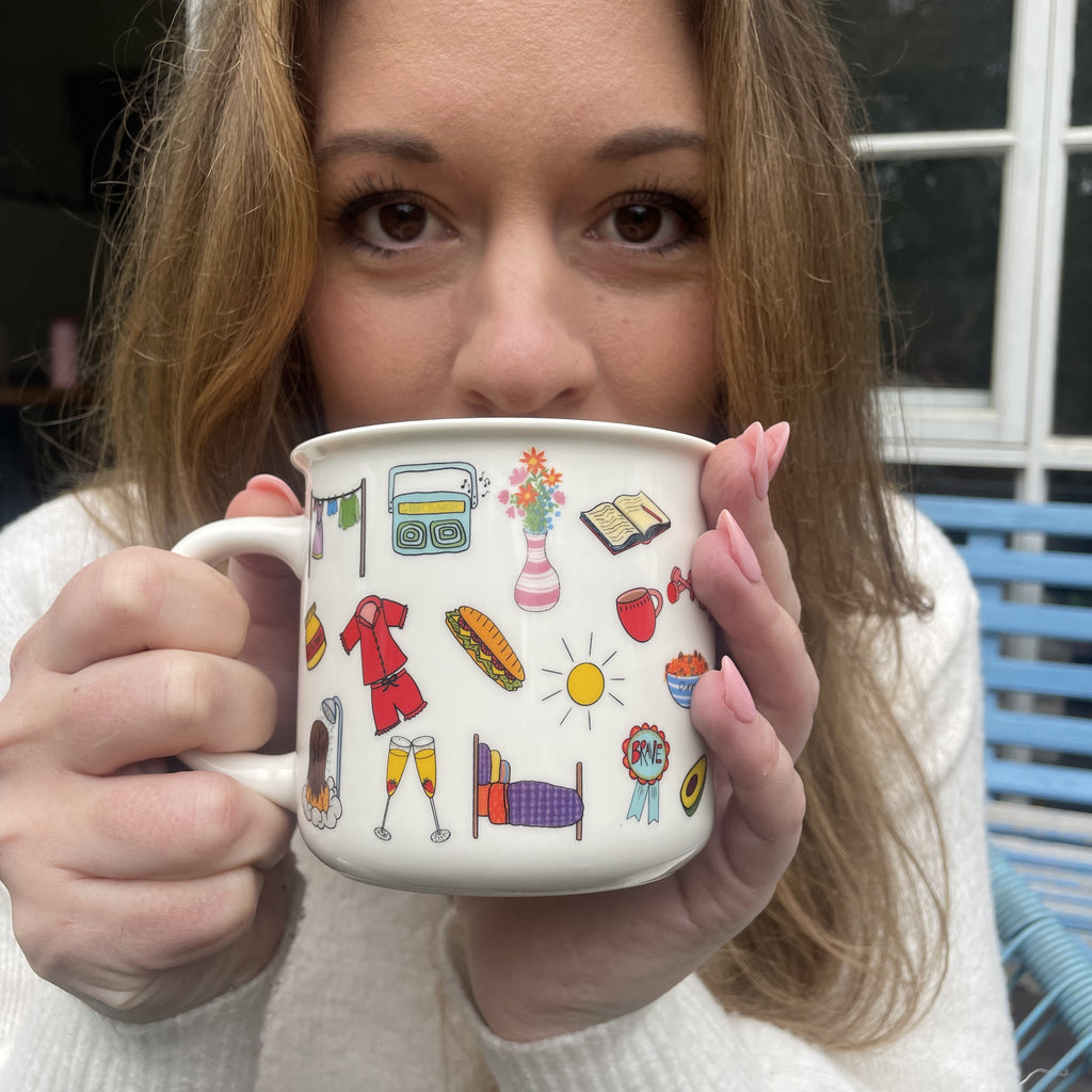 Pausing to take a sip out of a mug to remind us to lower the bar and celebrate the tiny wins of life